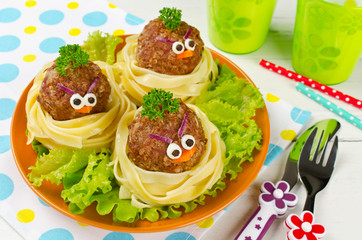 Funny spaghetti with meatballs for kids