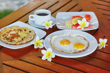 Delicious healthy breakfast on a tropical resort