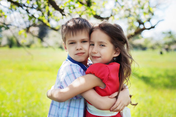 Happy children hugging