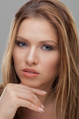 Naklejka premium Portrait of a fresh and lovely woman with blue eyes