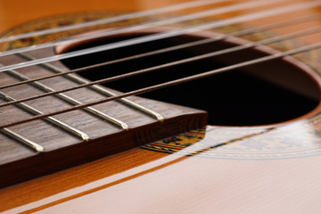 Fototapeta premium Detail of acoustic Classic Wood Guitar
