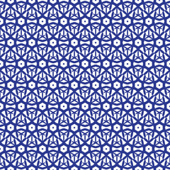 Fototapeta premium Blue and white moroccan seamless pattern. Oriental abstract motifs. Ceramic or textile net mesh pattern tiles.