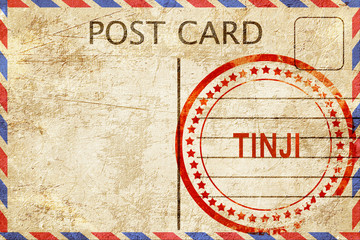 Fototapeta premium Tinji, vintage postcard with a rough rubber stamp