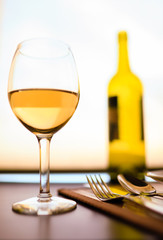Class of white wine in a restaurant. 