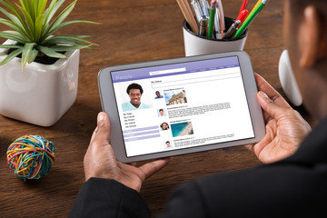 Businesswoman Chatting On Social Networking Site