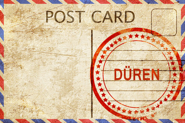 Fototapeta premium Duren, vintage postcard with a rough rubber stamp