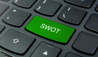 Business Concept: Close-up the SWOT Strengths, Weaknesses, Opportunities, Threats button on the keyboard and have Lime, Green color button isolate black keyboard © Around Ball