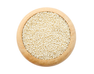 White sesame in wooden dish.