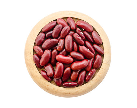 Red bean seeds in wooden dish.