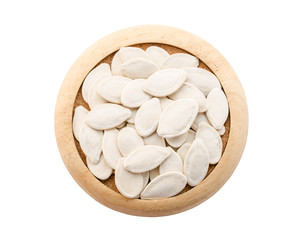 Pumpkin seeds on the white background
