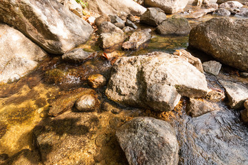 stone in waterfall
