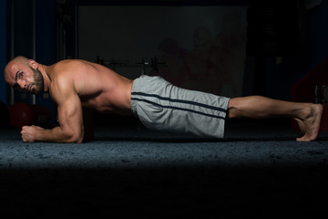 Healthy Man Doing Abdominal Excerise On Foor