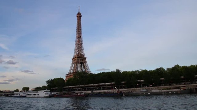 FRANCE, PARIS - JUNE 8, 2015: Famous Eiffel Tower from boat on river