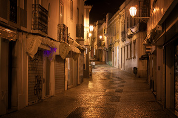 Fototapeta na wymiar Street of old european town at night