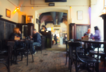 Fototapeta na wymiar Blurred background of cafe interior