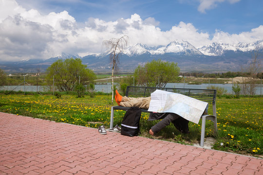 Man Sleeping On The Bench