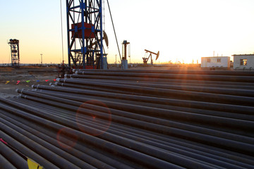 The silhouette of oilfield derrick