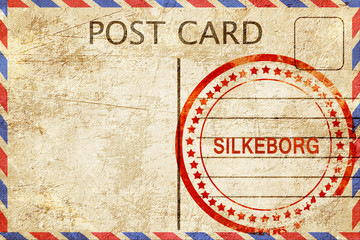 Fototapeta premium Silkeborg, vintage postcard with a rough rubber stamp