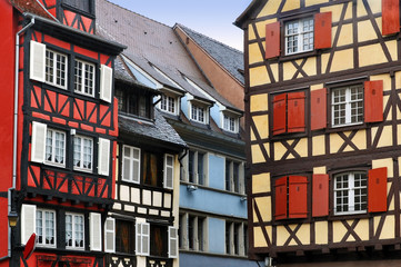 Old half-timbered houses of different colors. Colmar, Alsace, France.