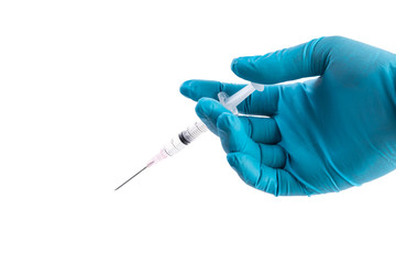 Hand in a blue glove holding syringe isolated on white