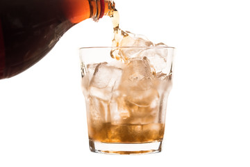 Cola glass with ice cubes isolated on white background