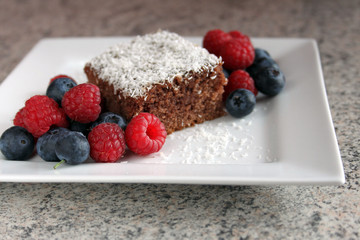 Chocolate cake served with berries