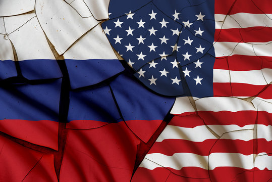 Flag of the USA and Russia on a cracked paint wall. A symbol of various conflict between these 2 nations i.e. economic, military, space, diplomatic, trade, armed, politic, investment, naval, areal.