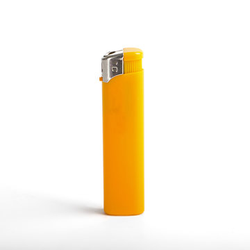 Yellow cigarette lighter isolated on a white