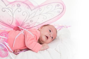 Adorable cute baby girl dressed as a fairy, princess, angel