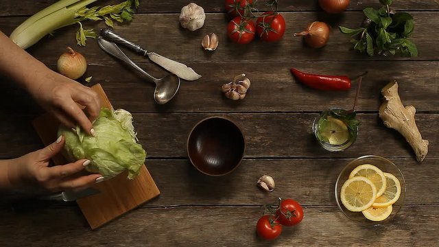 lettuce leaves on a wooden table top view