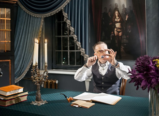 Elegant diamond collector sitting at the table