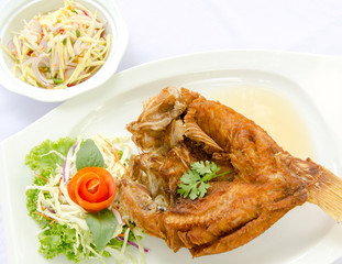 Deep fried red tilapia with fish sauce, Thai food..