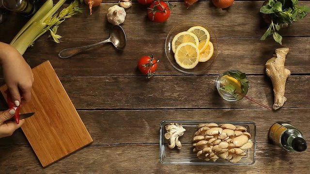 cooking pepper on a wooden surface. close-up