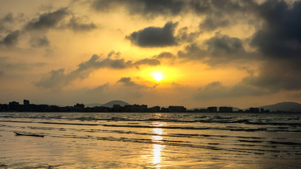 The skyline of the citya at sunset and ocean. Laredo, Cantabria, Spain.