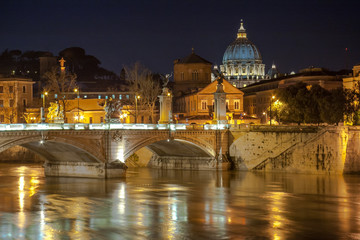 Angelo Bridge and St. Peter's Basilica in the twilight, Rome, Italy