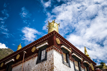Fototapeta na wymiar Golden bell on the roof of main assembly hall in the Sera monastery, Lhasa, Tibet