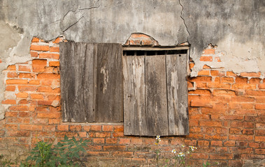 Old and ruin windows on vintage wall