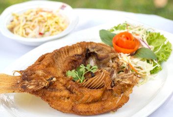 Deep fried red tilapia with fish sauce, Thai food.