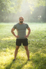 Portrait Of A Bodybuilder Posing Outdoors