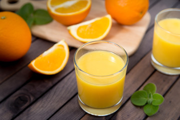 Naklejka na ściany i meble Orange juice in glass