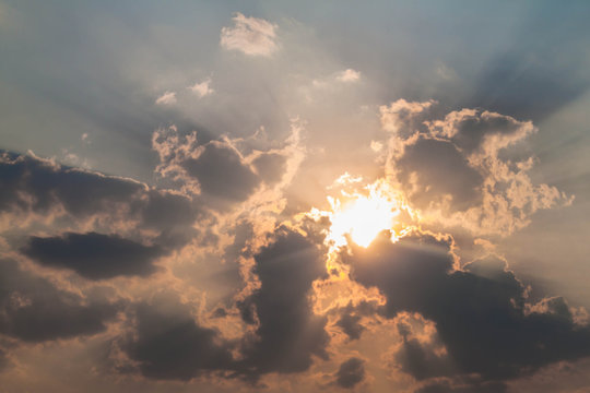 Sun shining through the clouds,Beautiful background © kirasama