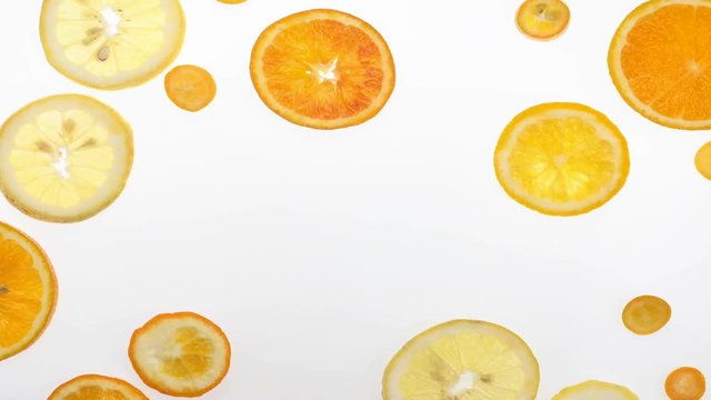 Fruit citrus animation over white with orange, lemon and kumquat