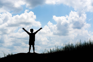 kid silhouette,Moments of the child's joy. On the Nature sunset