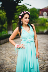 Brunette bridesmaid in blue dress