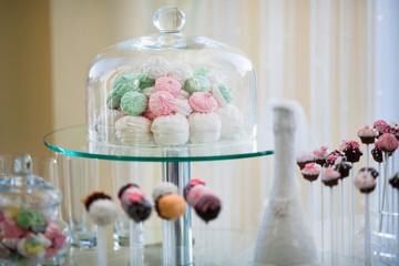 Beautiful wedding dessert table in restaurant
