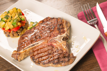 T bone steak with vegetables