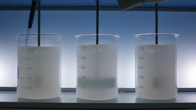 Dropping flocculant reagent in dirty water
