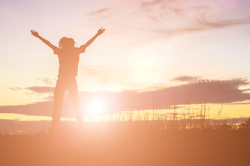 Fototapeta premium Silhouette of a beautiful girl jumping