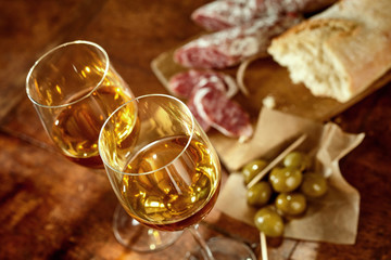 Two glasses of sherry with Spanish tapas © exclusive-design
