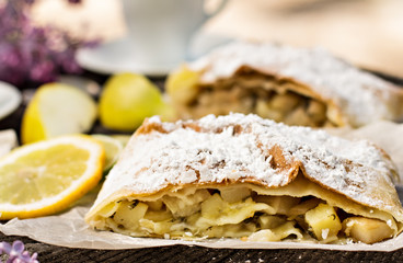 pie, strudel with pear and lemon. Cup of coffee. .Picnic, Breakfast in nature. Food in nature.